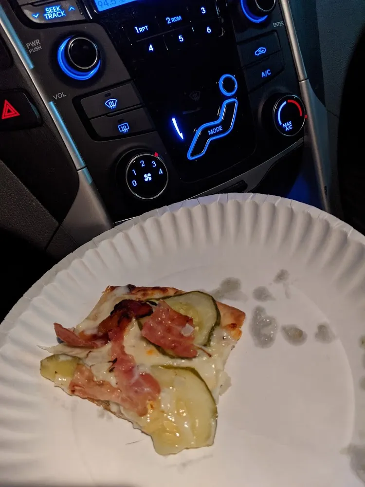 Slice of Their Pickle Pizza
